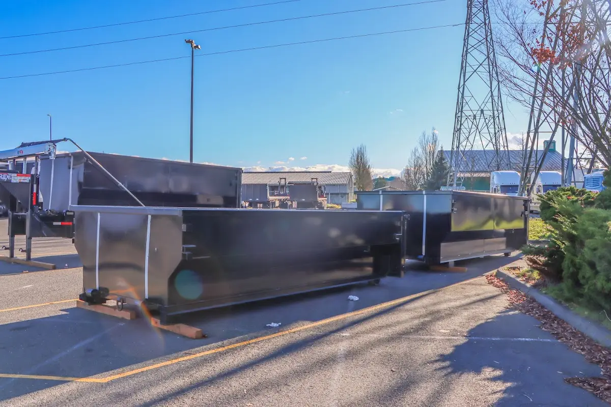 Roll-off dumpster ready for waste disposal at job site for Concrete Dumpster Rental in New Castle